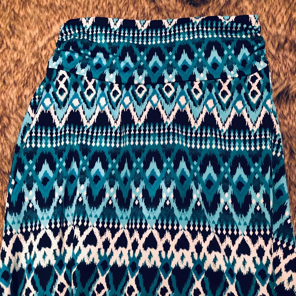 Long Blue, black, and white skirt.